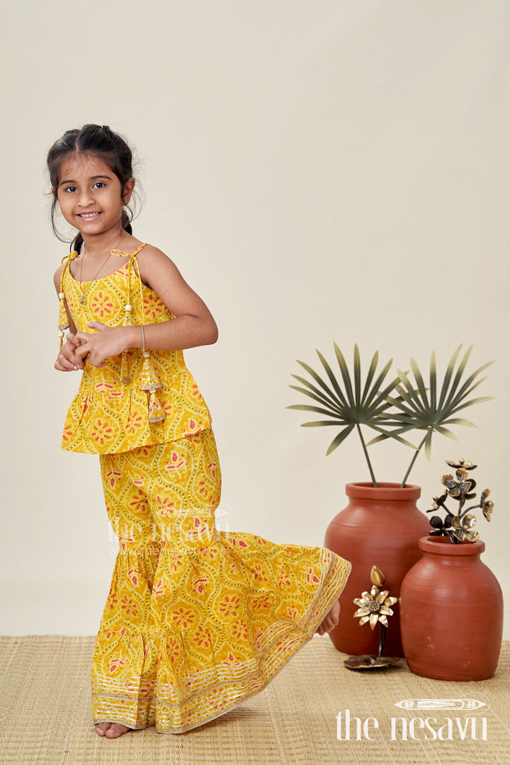 Girls ethnic sharara set with yellow floral prints for festivals