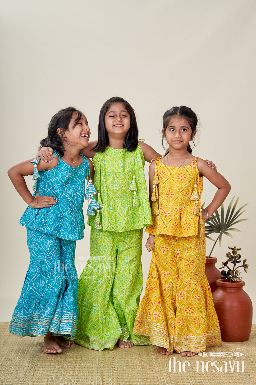 Girls ethnic sharara set with yellow floral prints for festivals