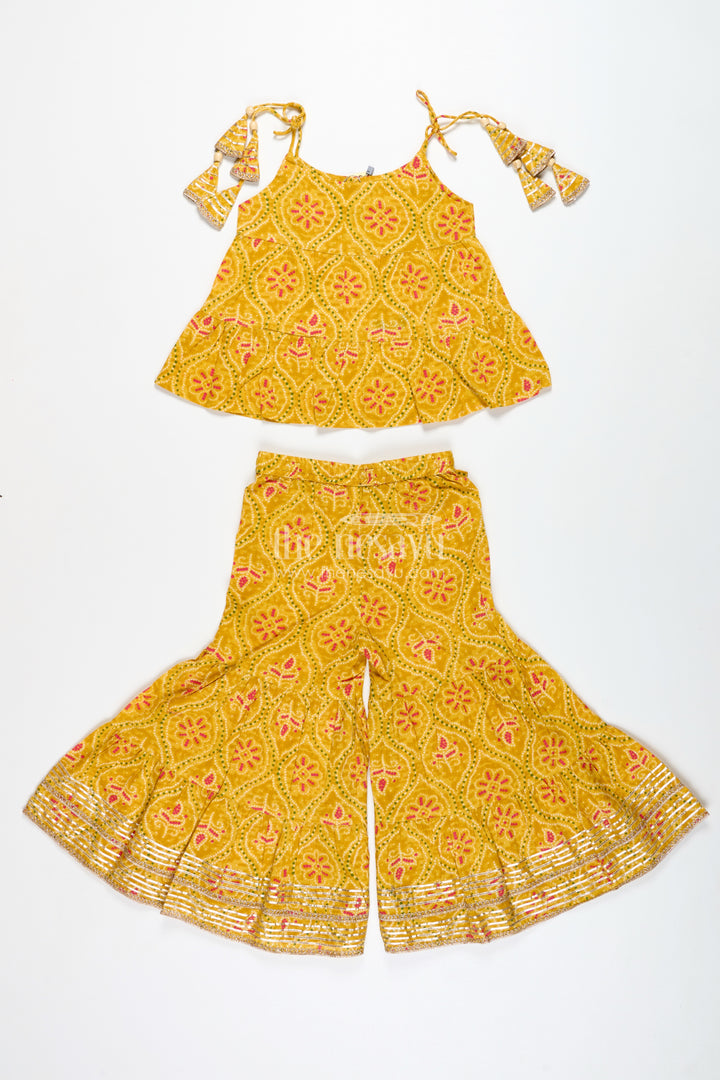 Girls ethnic sharara set with yellow floral prints for festivals