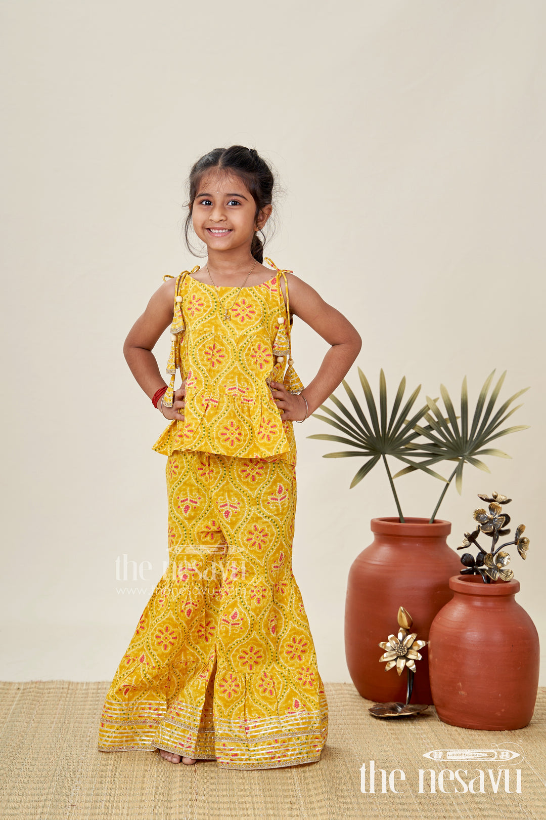 Girls ethnic sharara set with yellow floral prints for festivals
