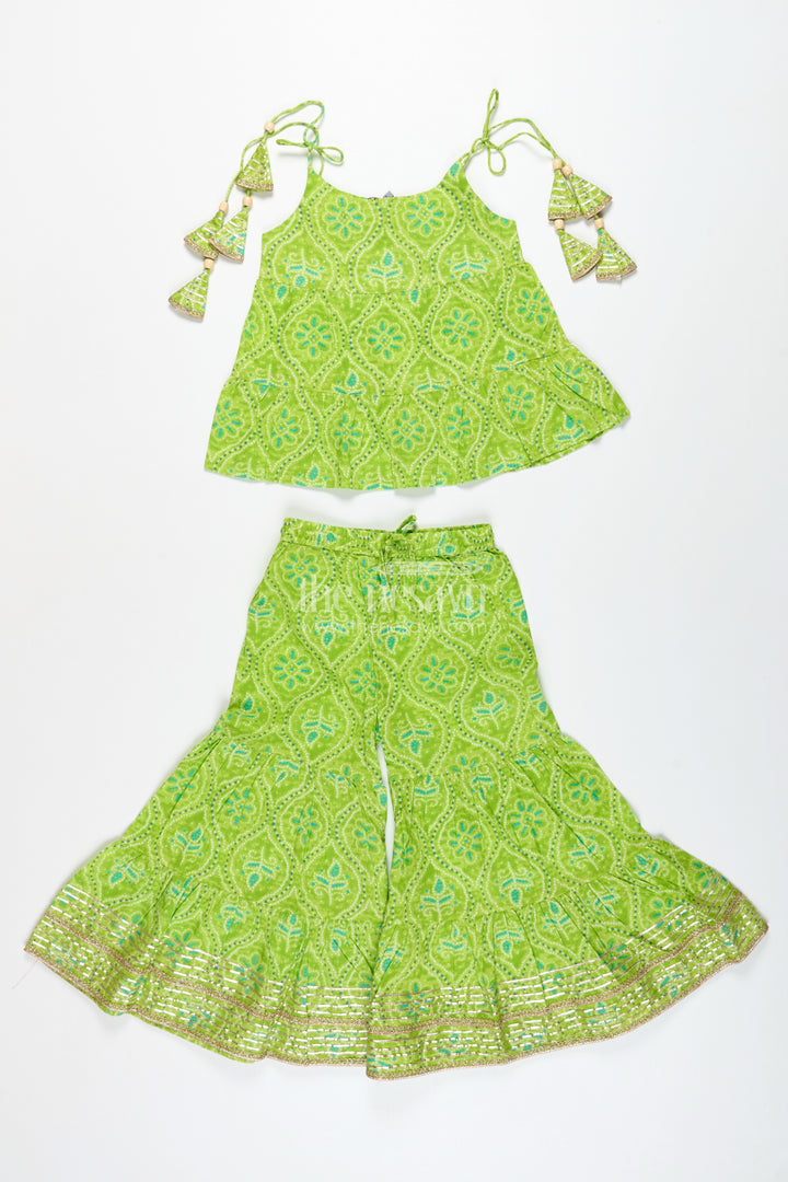 Girls green halter top with ethnic printed skirt for festive occasions
