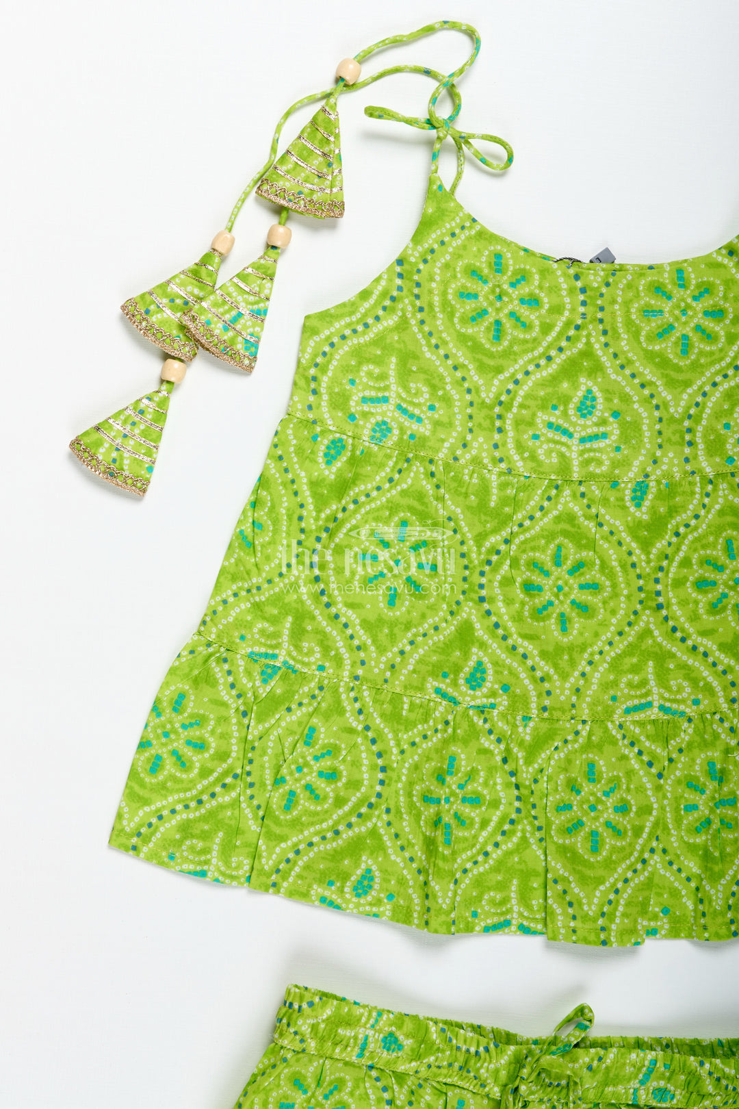 Girls green halter top with ethnic printed skirt for festive occasions