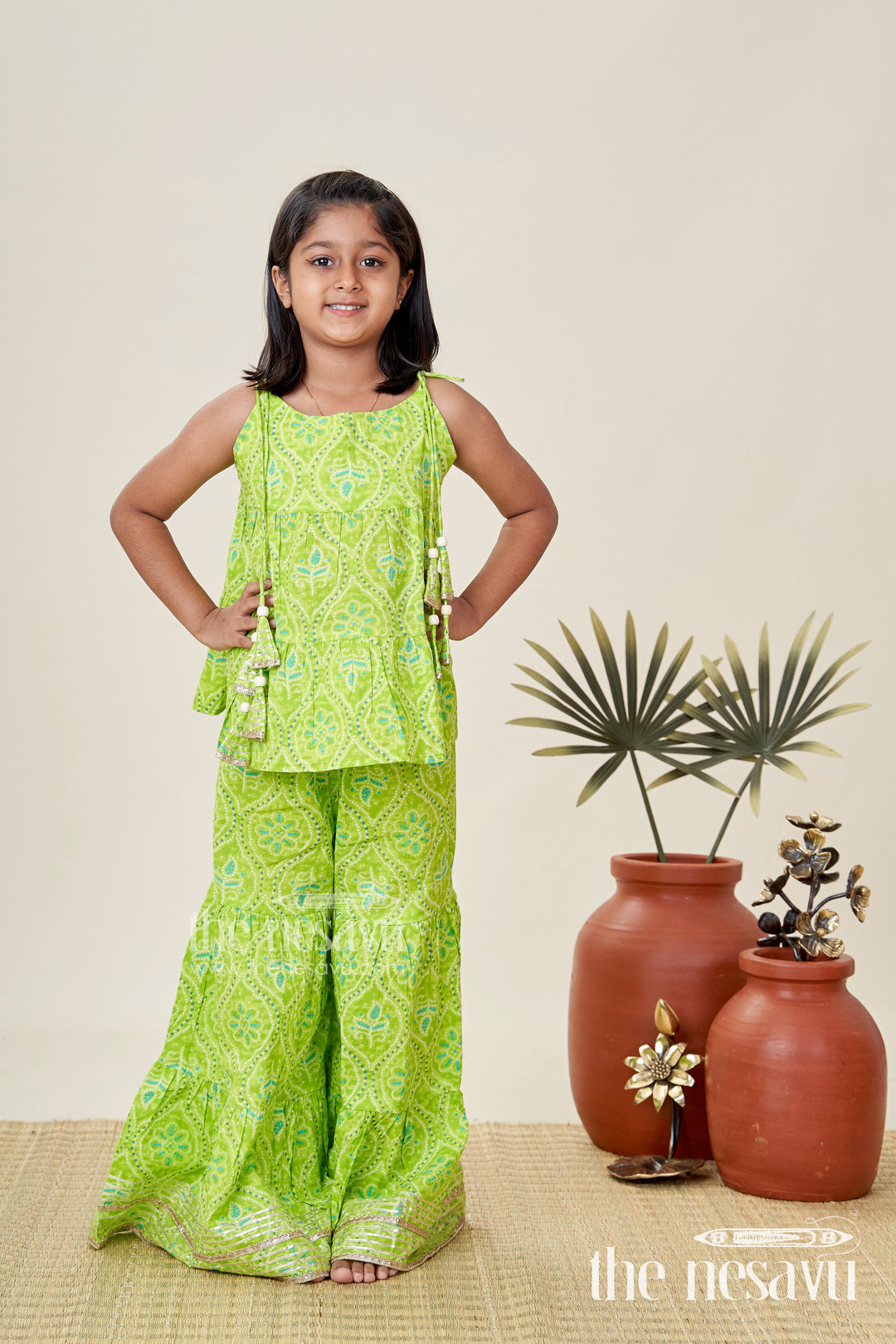 Girls green halter top with ethnic printed skirt for festive occasions