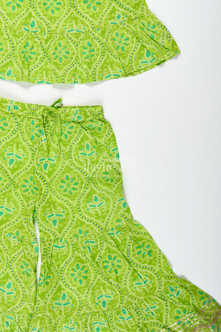 Girls green halter top with ethnic printed skirt for festive occasions