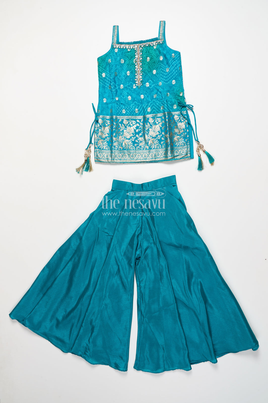 Girls sharara set in viscose silk with embroidered yoke for festive wear