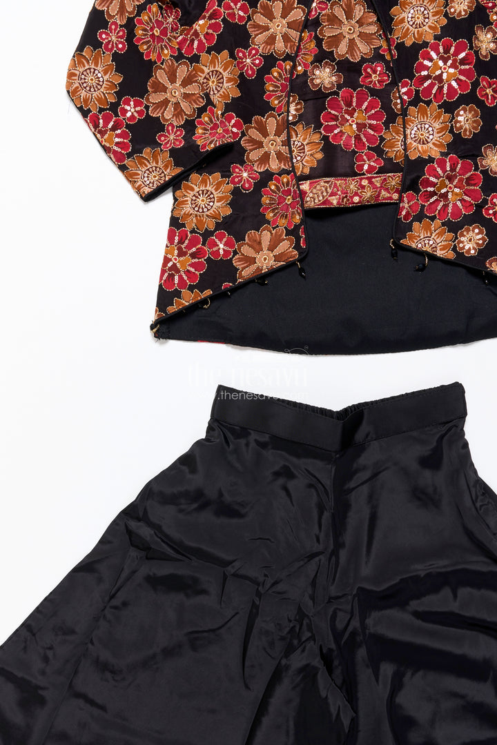Elegant black sharara set with rich floral embroidery