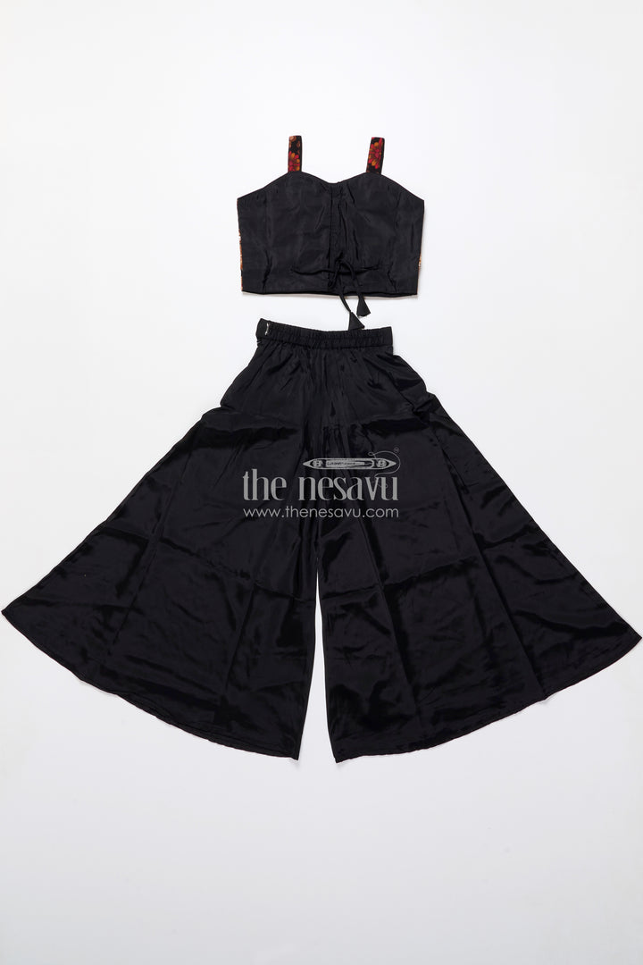 Elegant black sharara set with rich floral embroidery