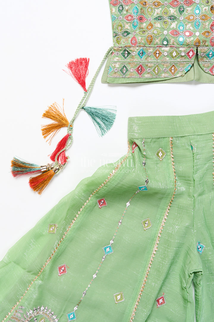 Mirror embroidered green sharara set with colorful tassels