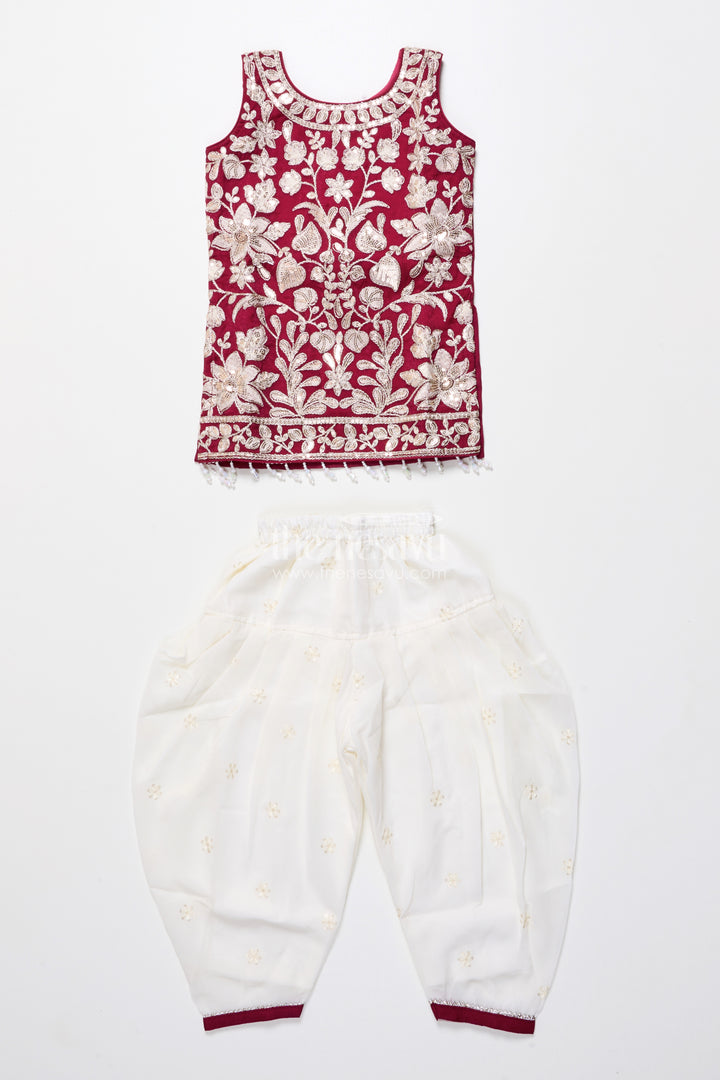 Maroon and ivory embroidered ethnic kurti set