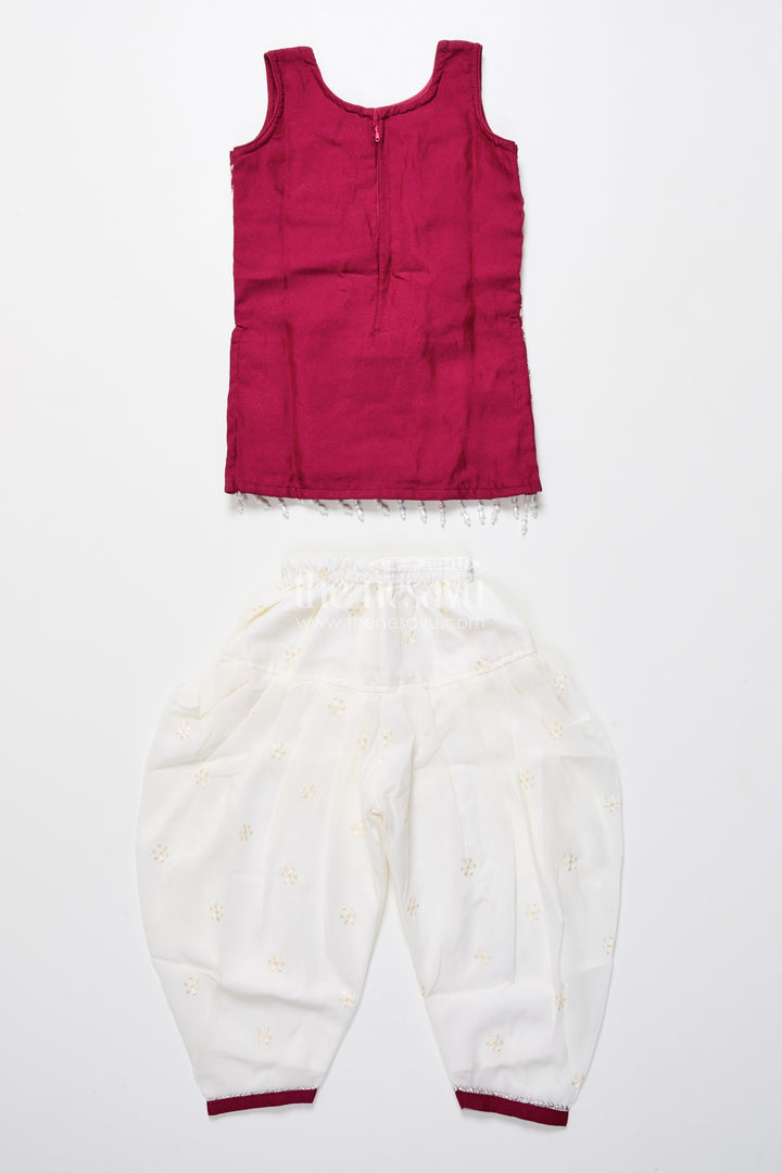 Maroon and ivory embroidered ethnic kurti set