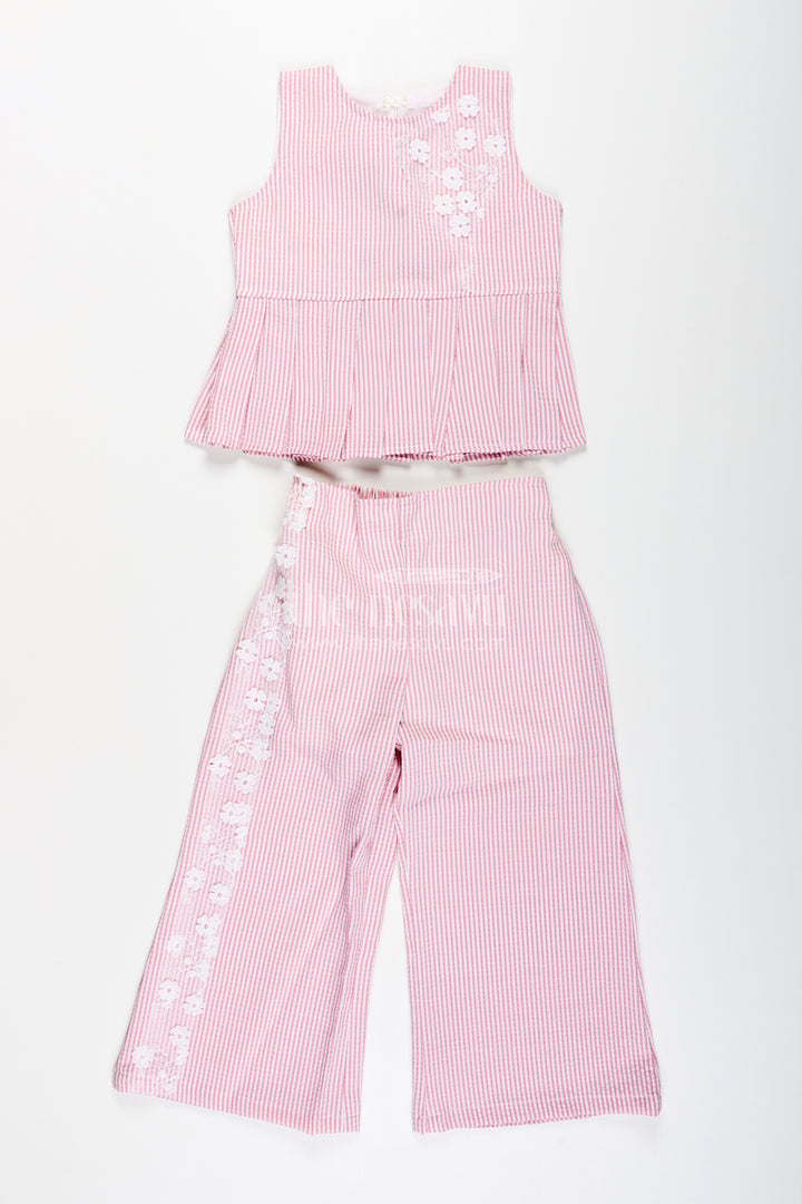 Girls plazo set with peplum top and floral applique