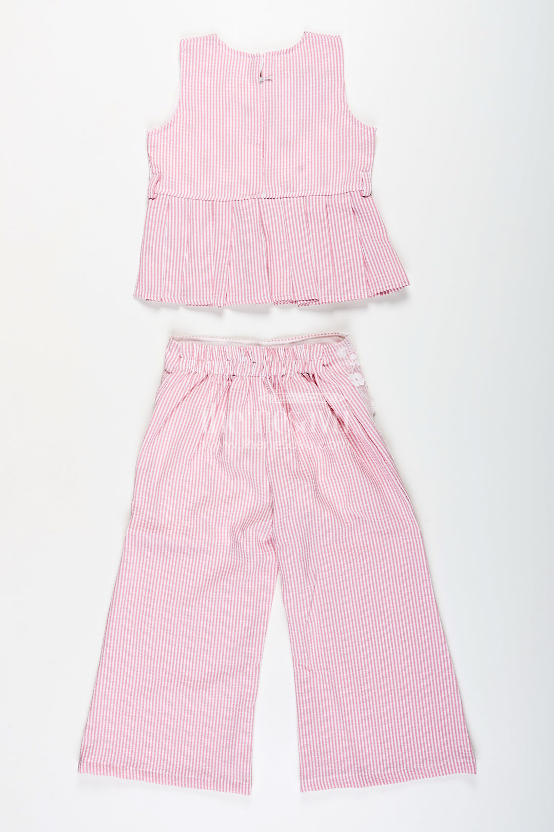 Girls plazo set with peplum top and floral applique