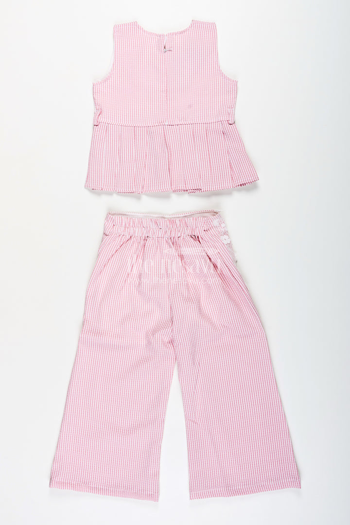 Girls plazo set with peplum top and floral applique