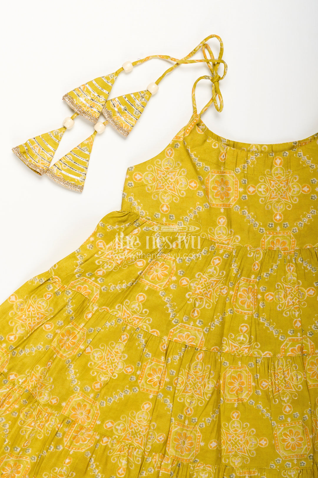 Girls yellow sharara set with printed tiered kurti for festive dressing