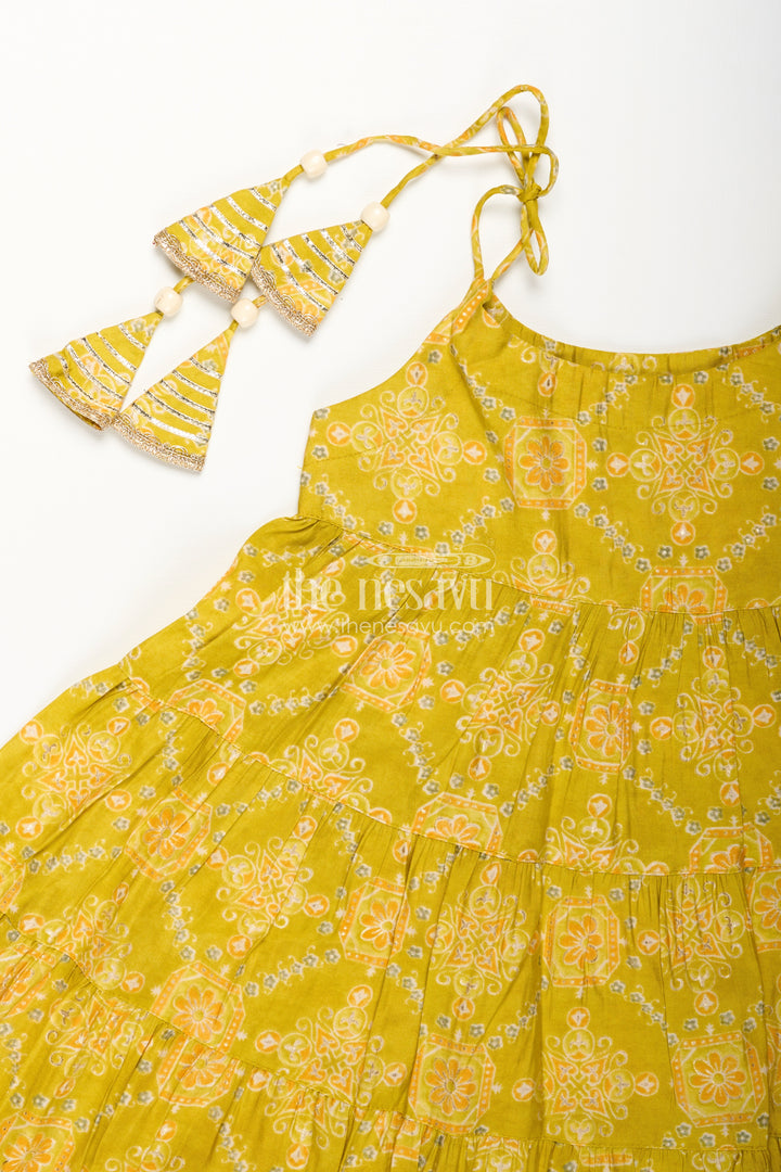 Girls yellow sharara set with printed tiered kurti for festive dressing
