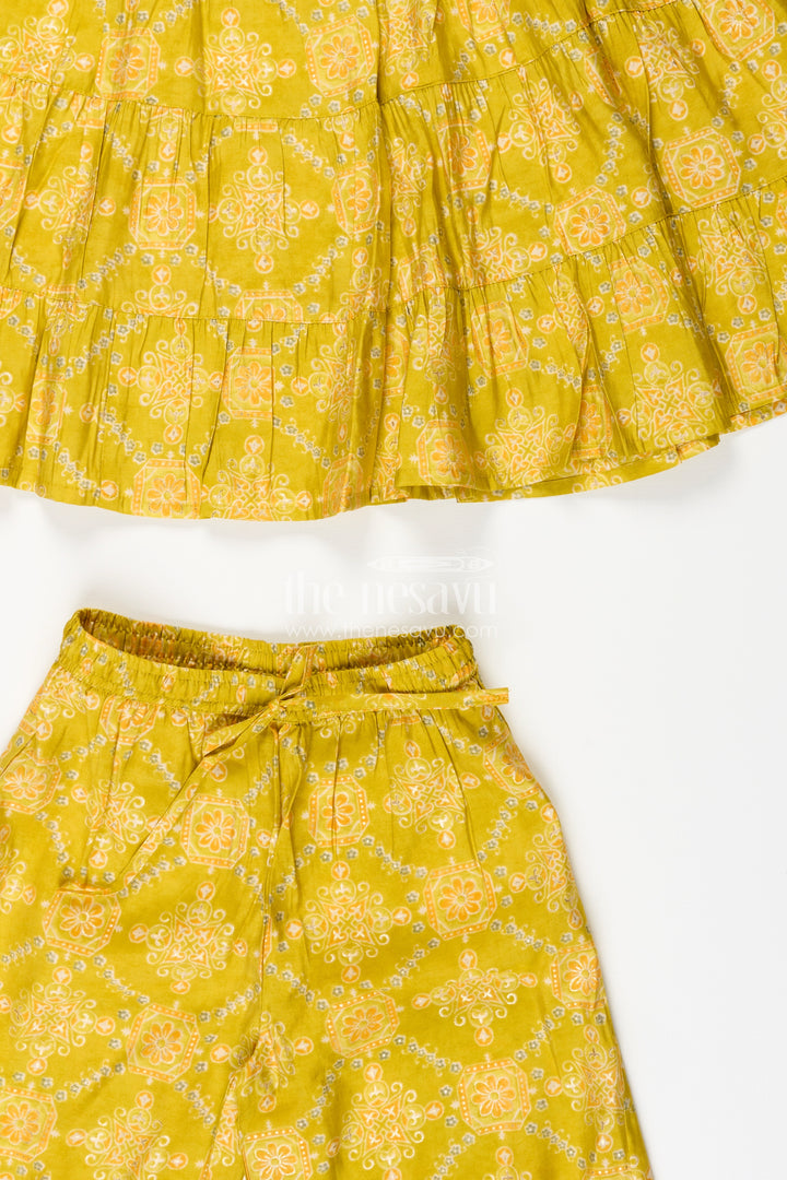 Girls yellow sharara set with printed tiered kurti for festive dressing