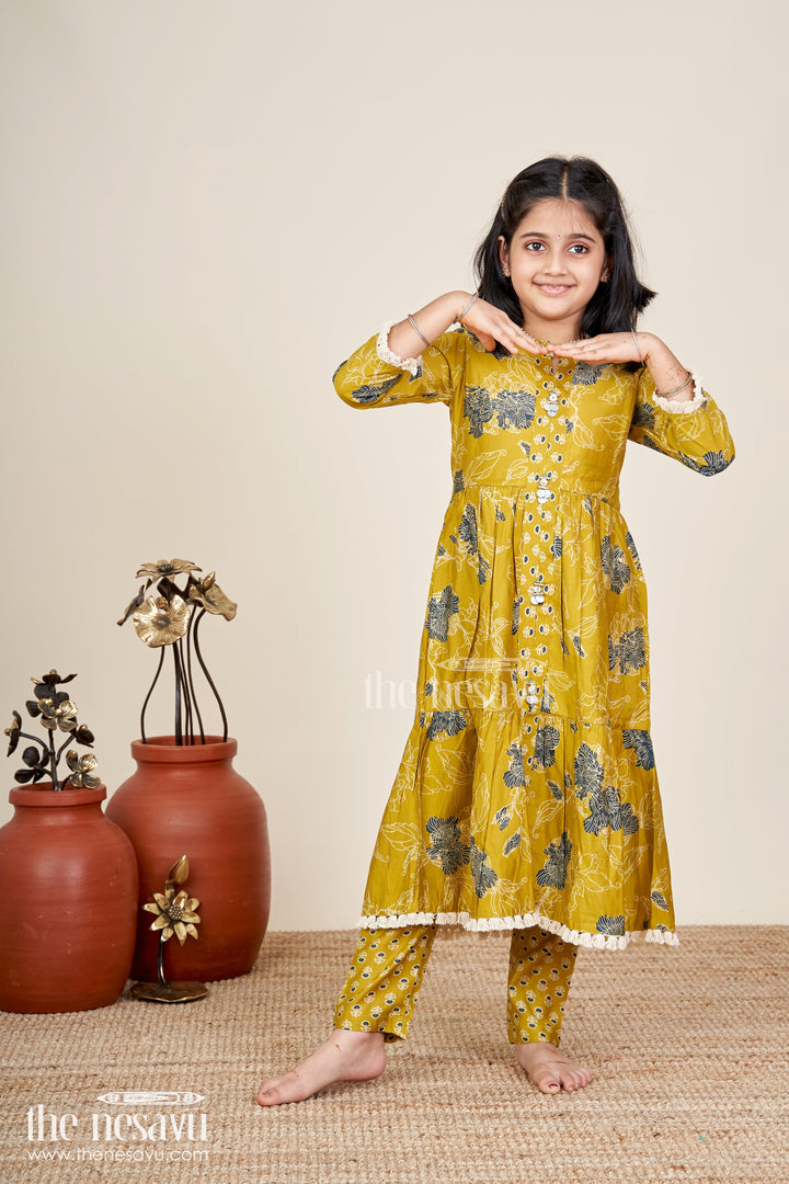 Girls mustard sharara set with black floral print for festive wear