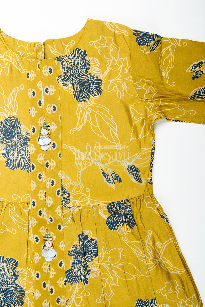 Girls mustard sharara set with black floral print for festive wear