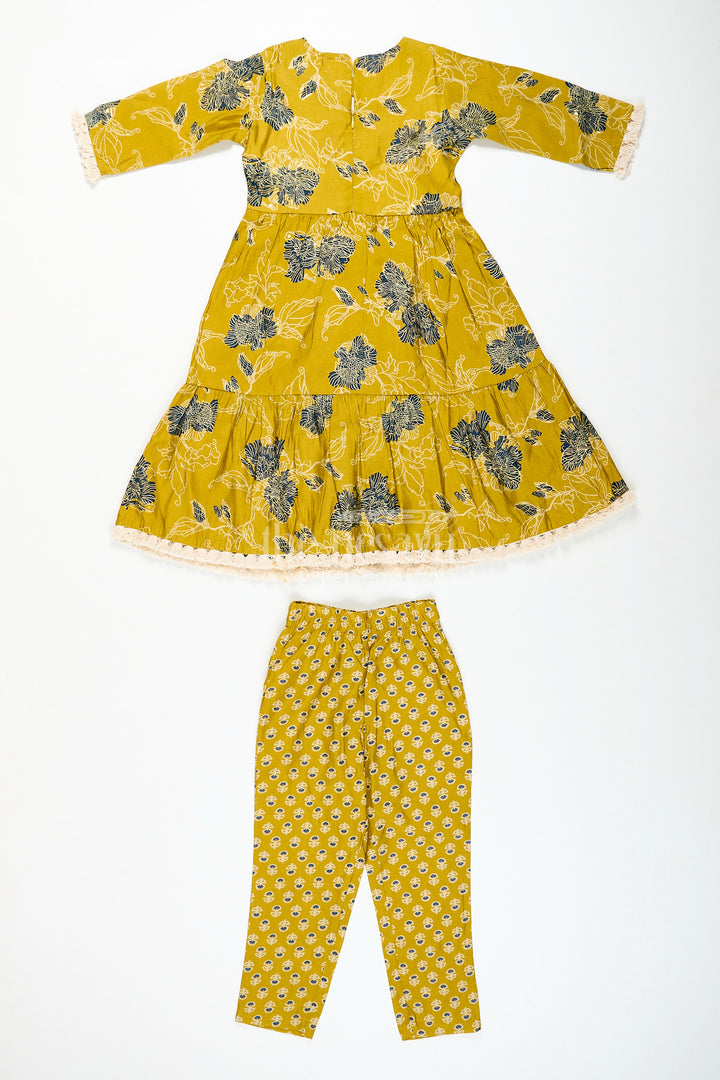 Girls mustard sharara set with black floral print for festive wear