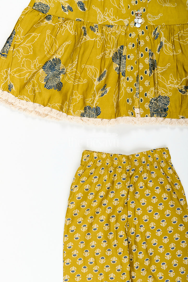 Girls mustard sharara set with black floral print for festive wear