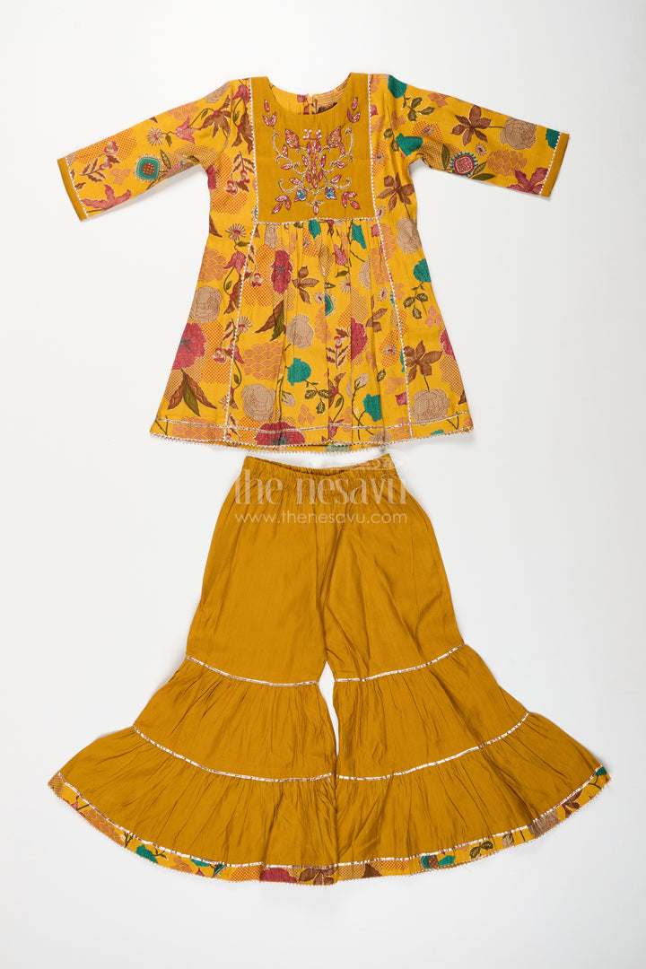 Girls sharara set with mustard floral print for festive functions
