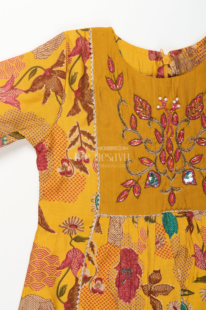 Girls sharara set with mustard floral print for festive functions