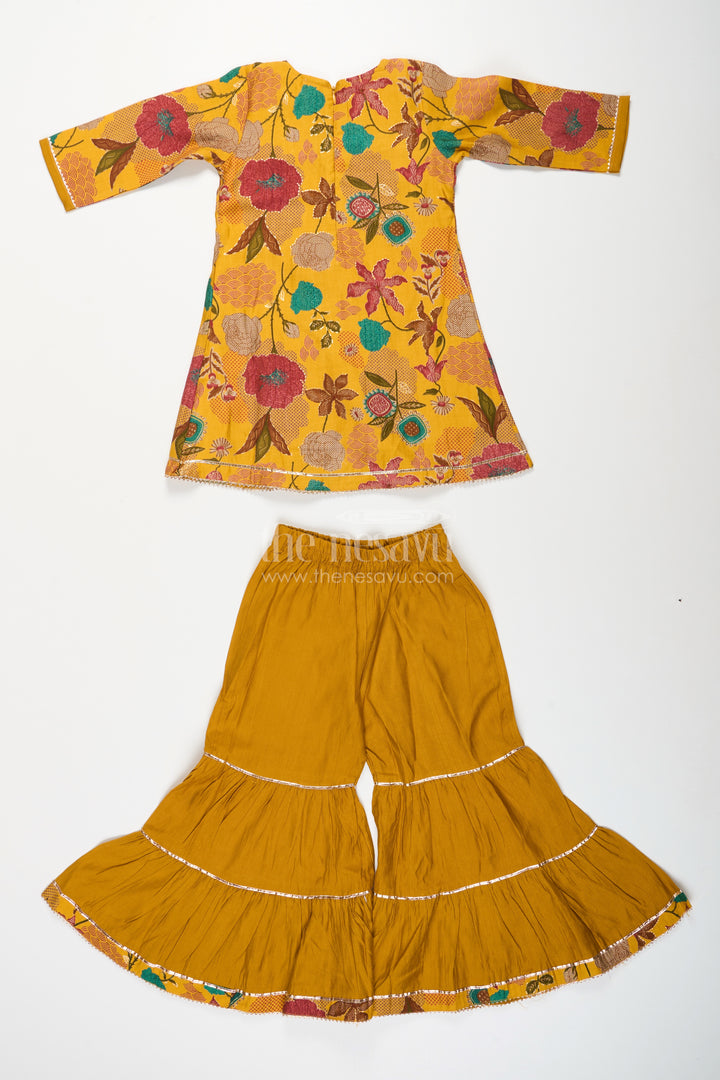 Girls sharara set with mustard floral print for festive functions