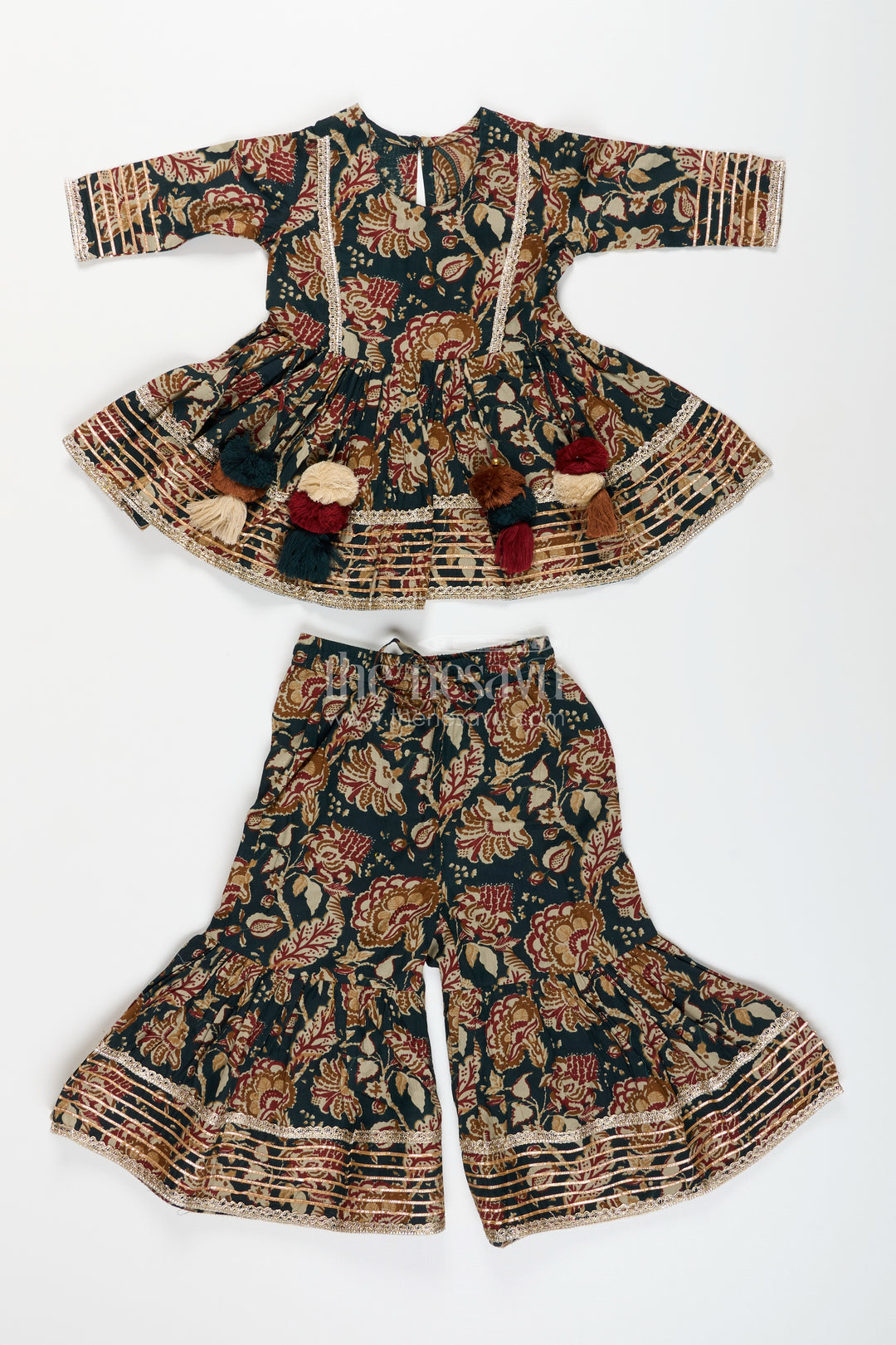 Girls plazo set with bold floral block print and festive flair