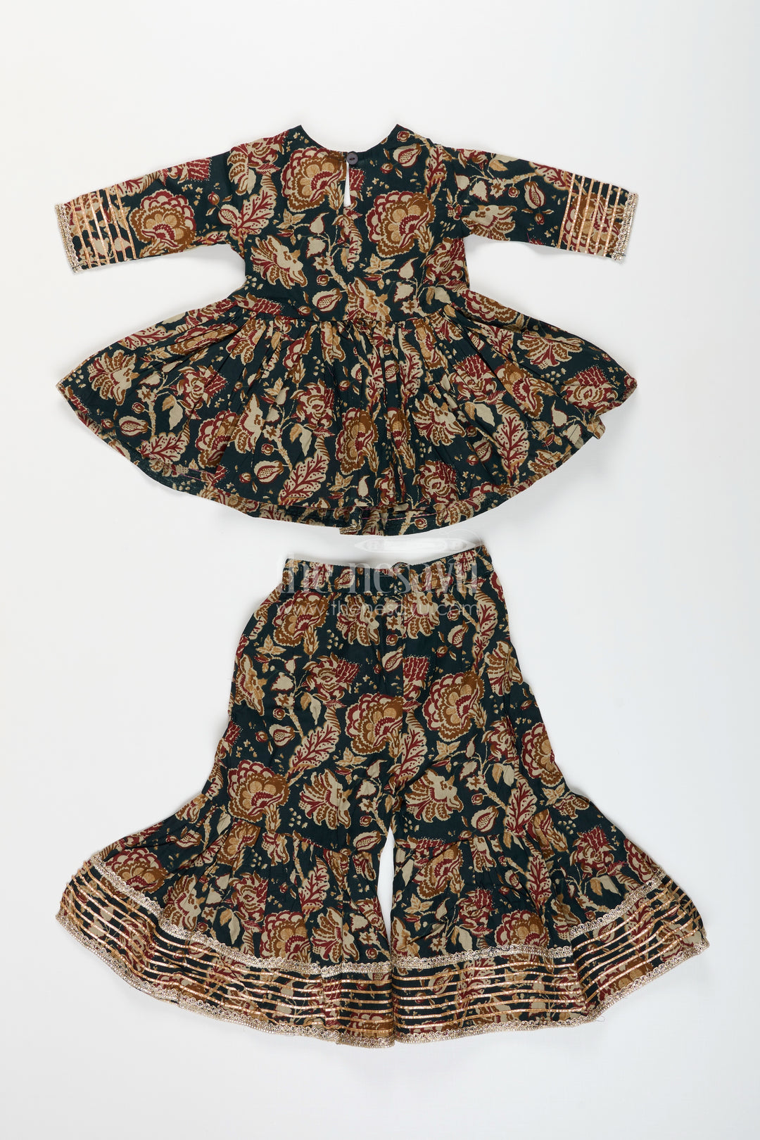 Girls plazo set with bold floral block print and festive flair