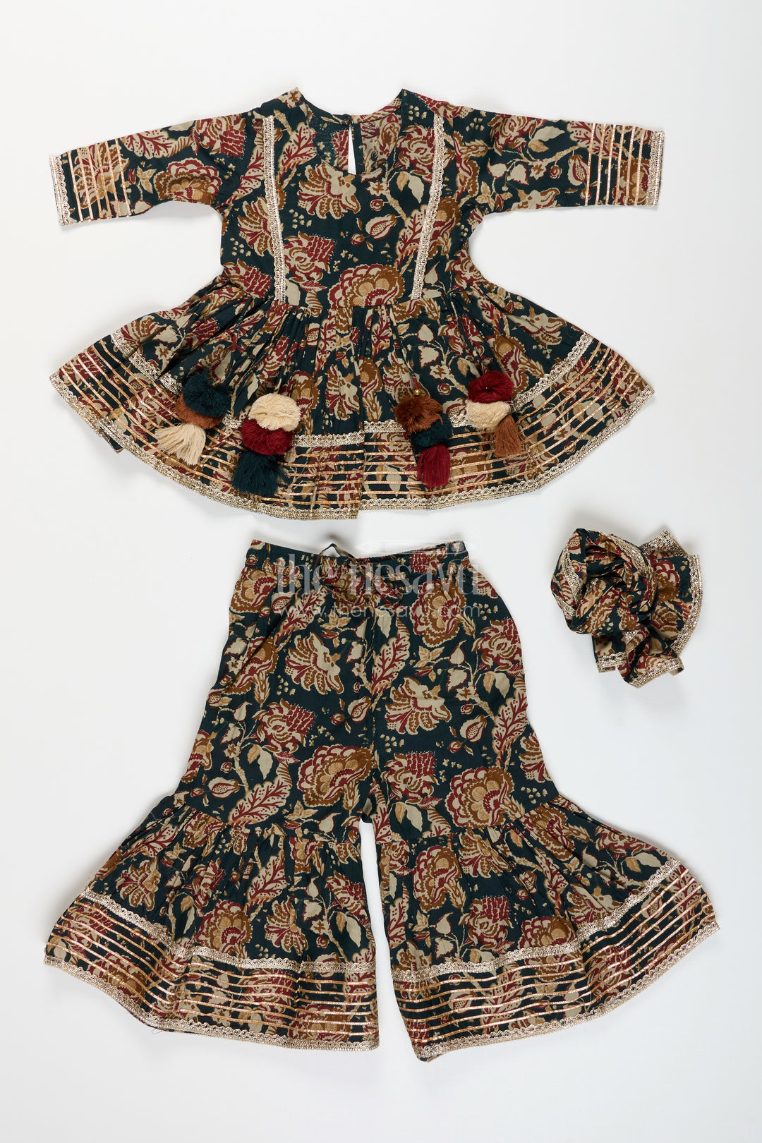 Girls plazo set with bold floral block print and festive flair