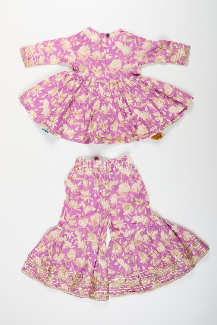 Girls floral sharara set with embellished neckline and gota lace