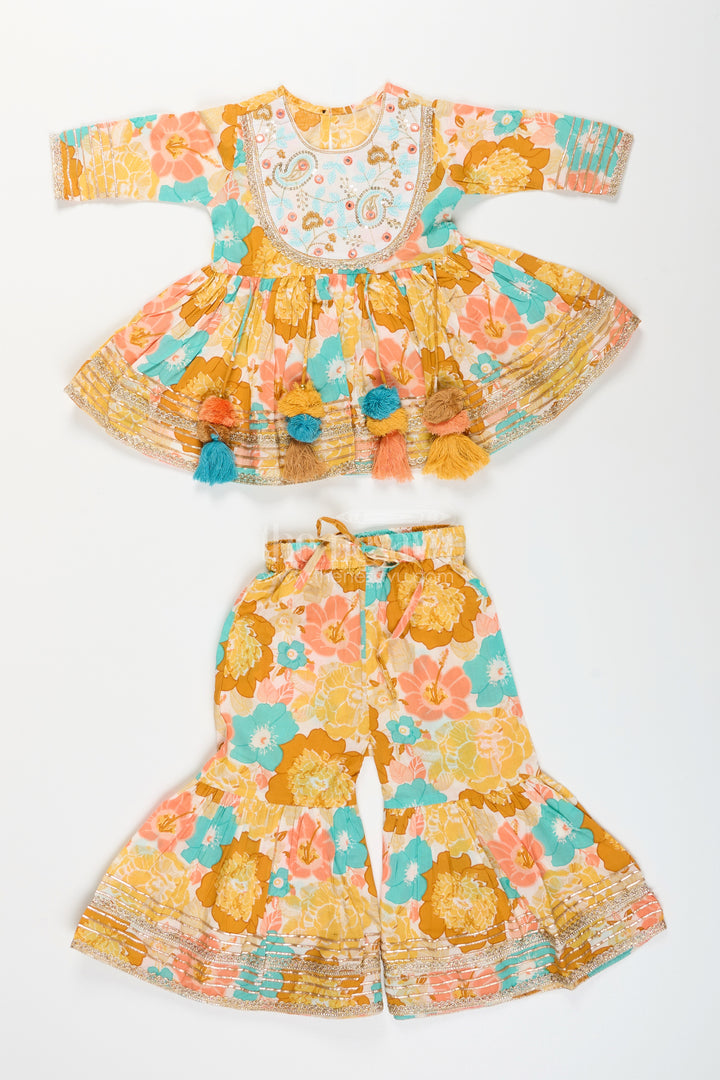 Girls yellow cotton sharara set with tassels and floral block print for ethnic days