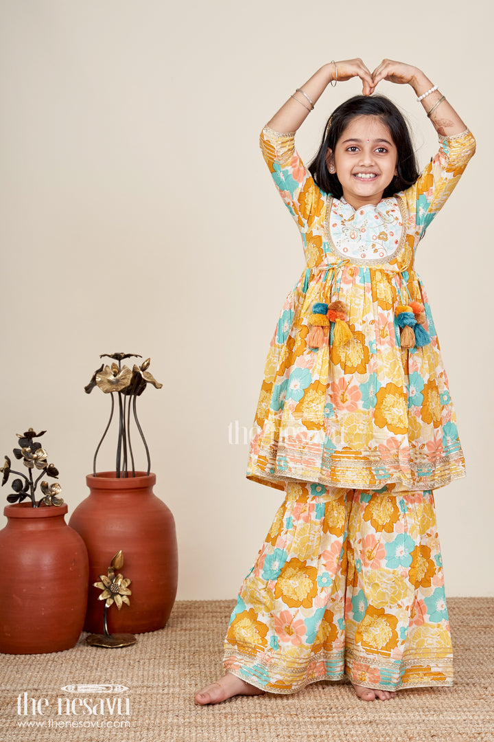 Girls yellow cotton sharara set with tassels and floral block print for ethnic days