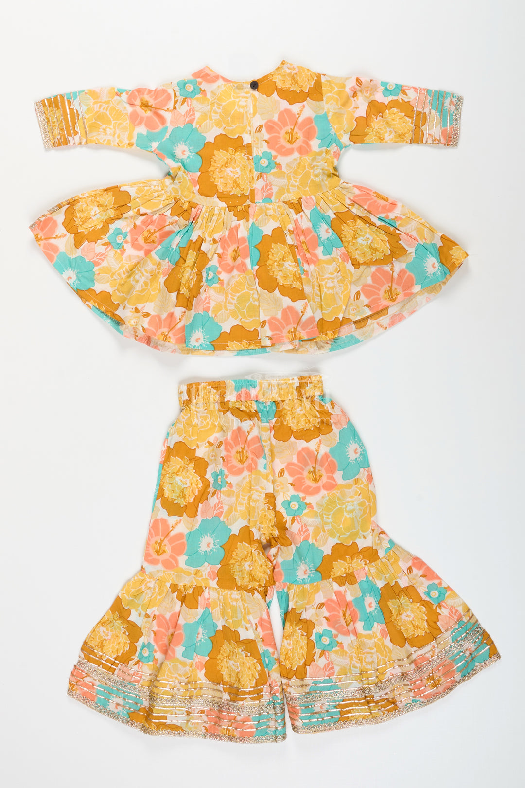 Girls yellow cotton sharara set with tassels and floral block print for ethnic days