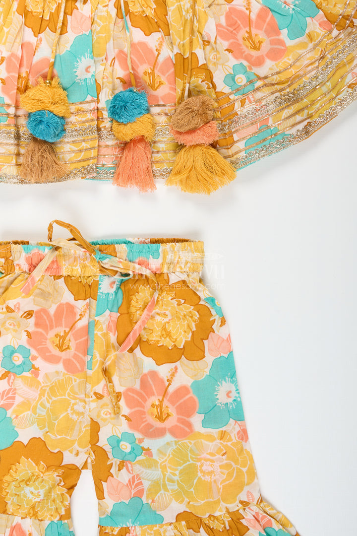 Girls yellow cotton sharara set with tassels and floral block print for ethnic days