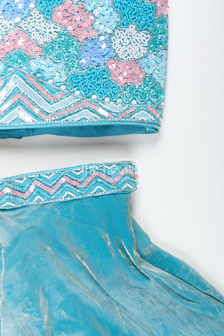 Girls blue sharara set with floral embroidered top for festive occasions