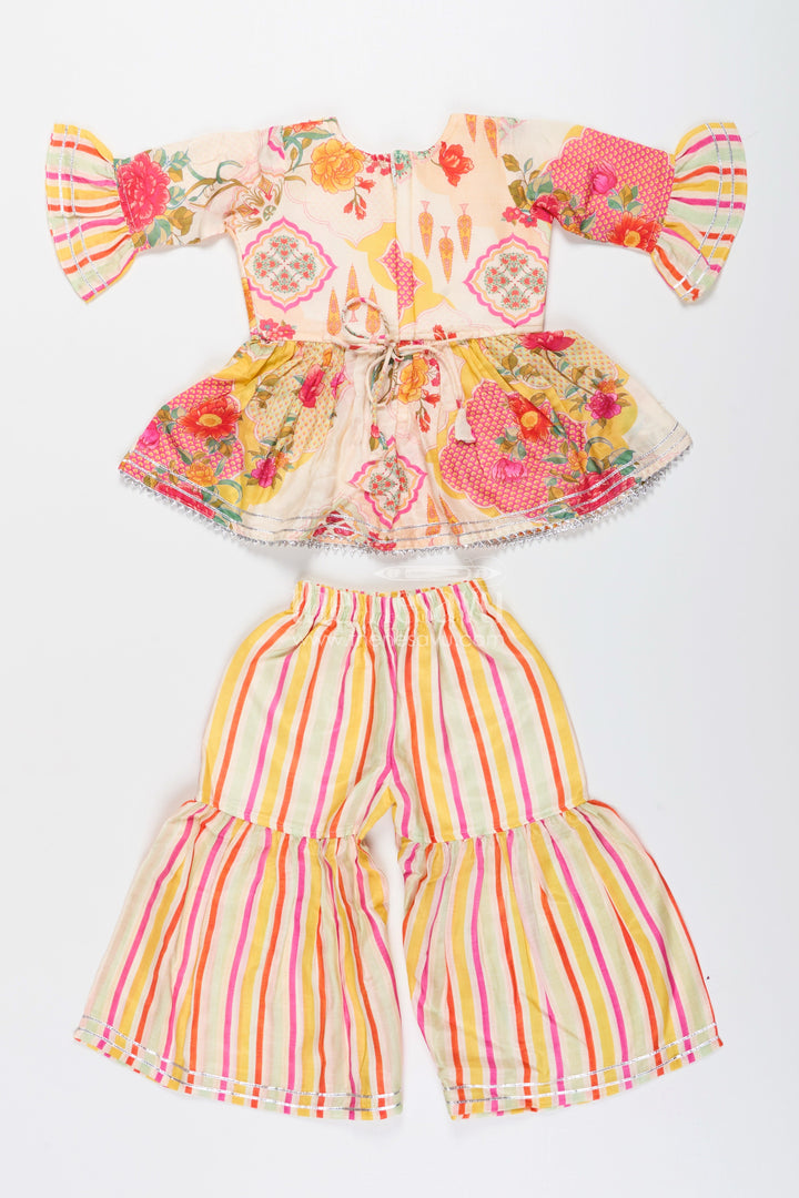 Girls cream sharara set with floral top for ethnic parties and photoshoots