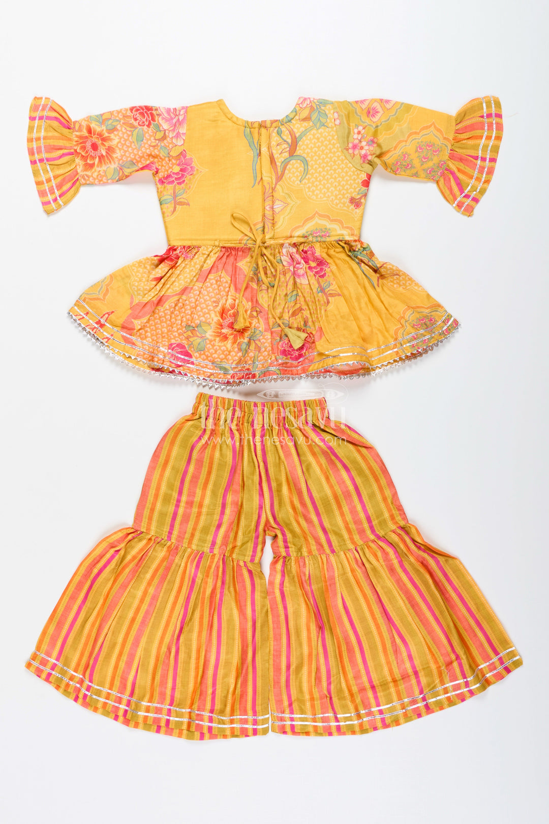 Girls yellow sharara set with ethnic floral print for festive functions