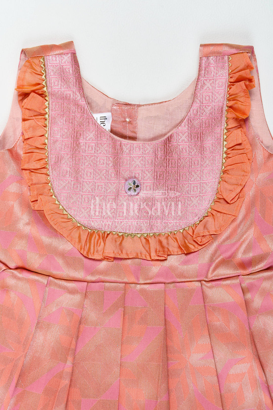 Traditional Silk Frock in Peach for Festive Gatherings