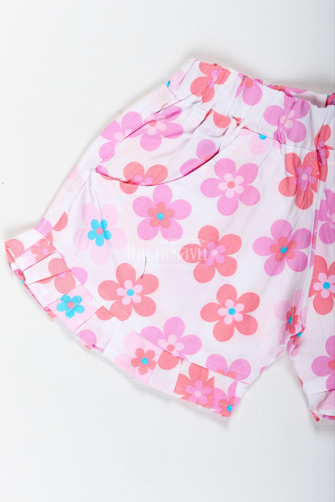 Girls Pink Floral Cotton Shorts With Pleated Hem For Playful Summer Wear