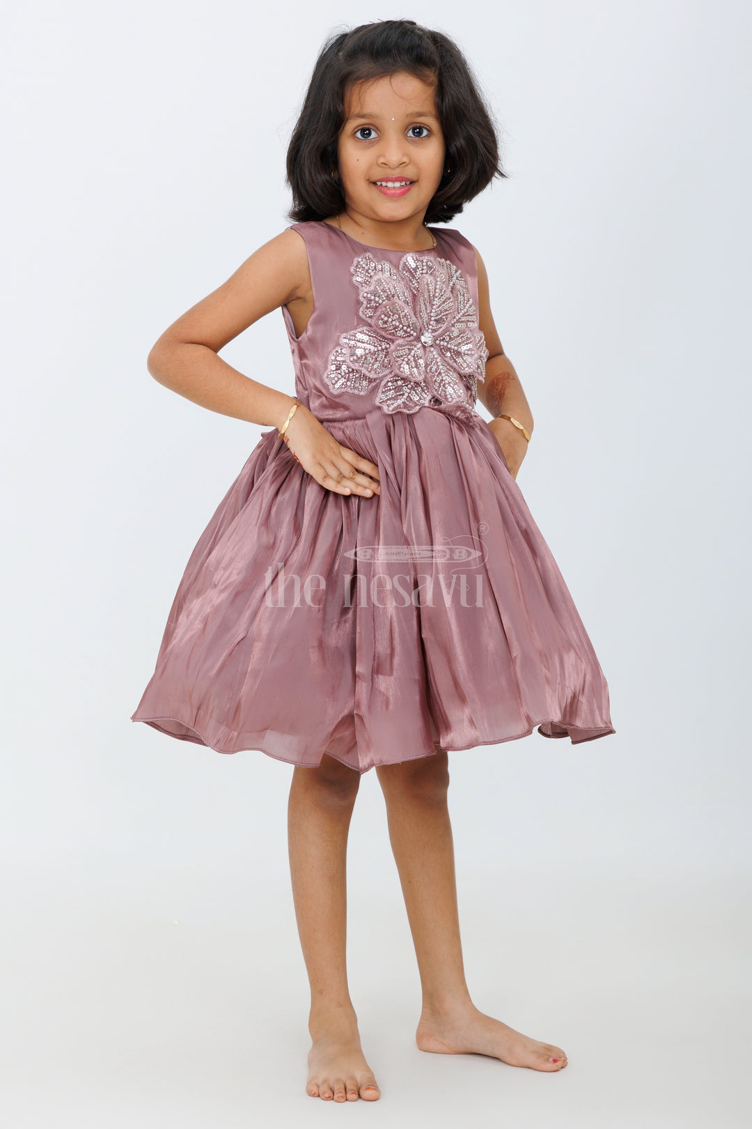 Girls Party Wear Pink Organza Frock with Embellished Bodice and Flared Skirt in Elegant party wear pink frock Look