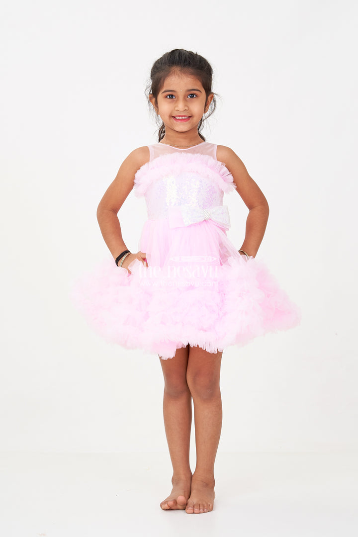 Adorable Pink Net Party Dress for Girls with Ruffled Layers and Sparkling Bow