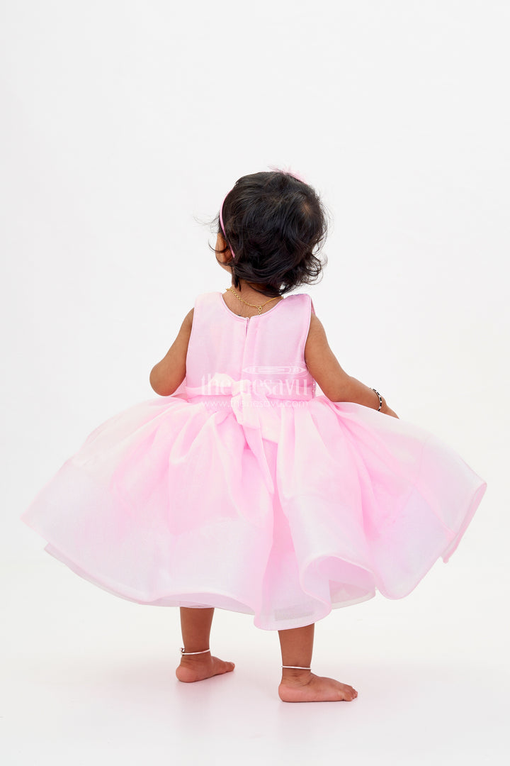 Baby Girls Fancy Frock in Pink Shimmer Fabric with Oversized Bow and Flared Silhouette