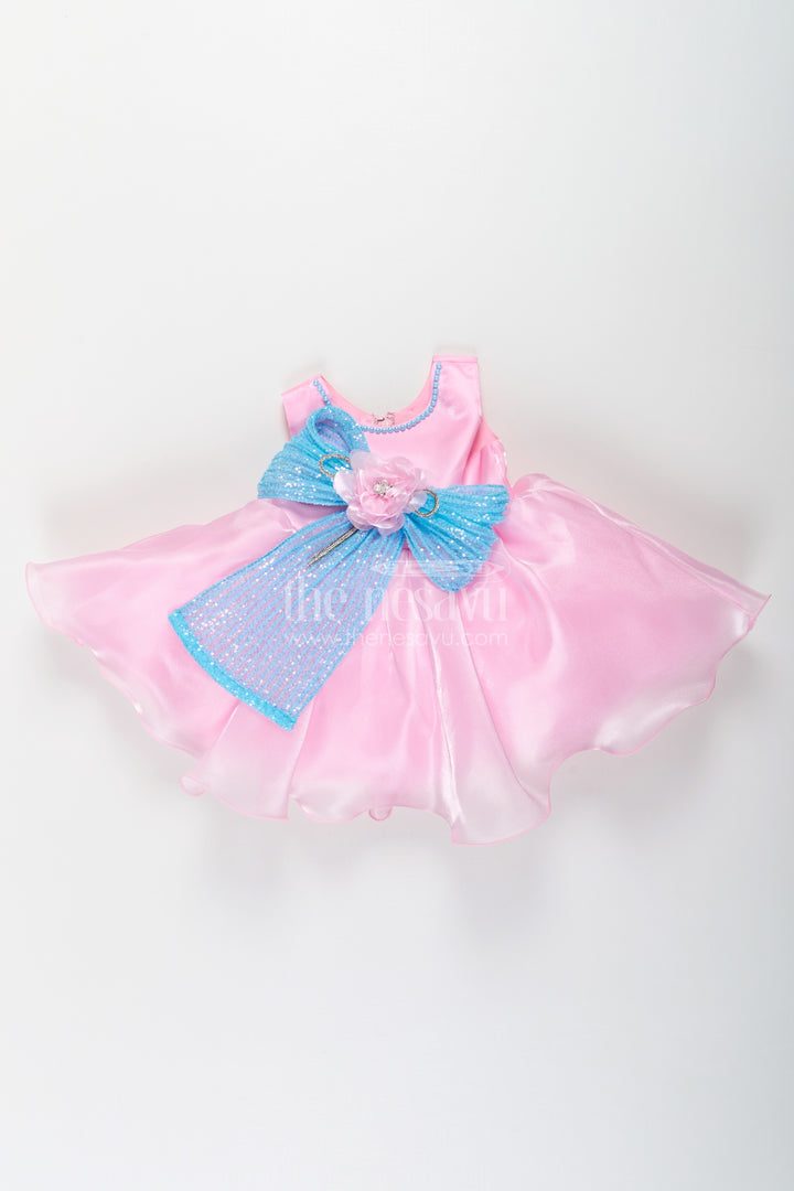 Girls Pink Net Frock with Blue Glitter Bow and Floral Accent in Glazed Organza Fabric