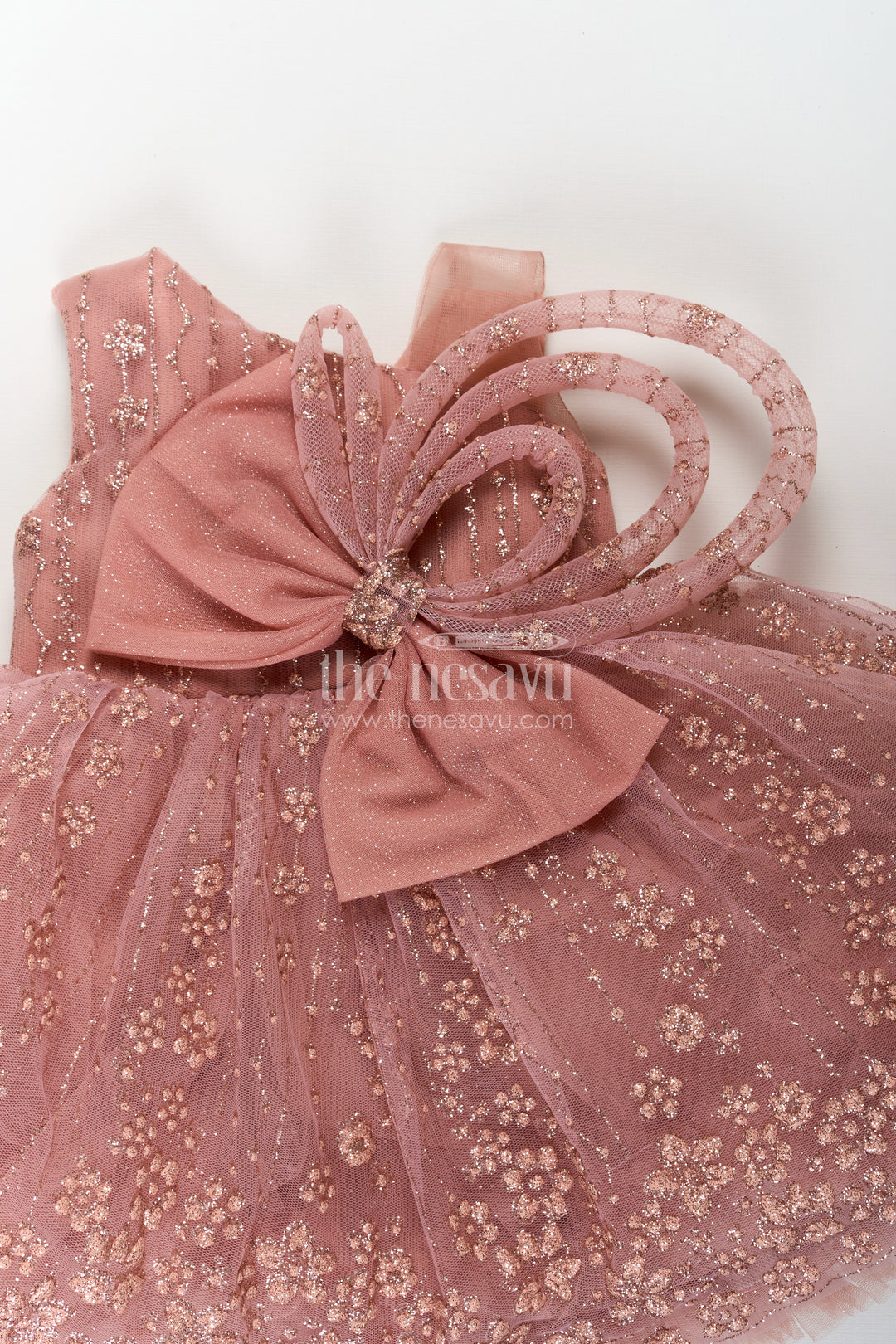 Girls Short Frock Design in Soft Net with Designer Embroidery and Statement Bow Embellishment