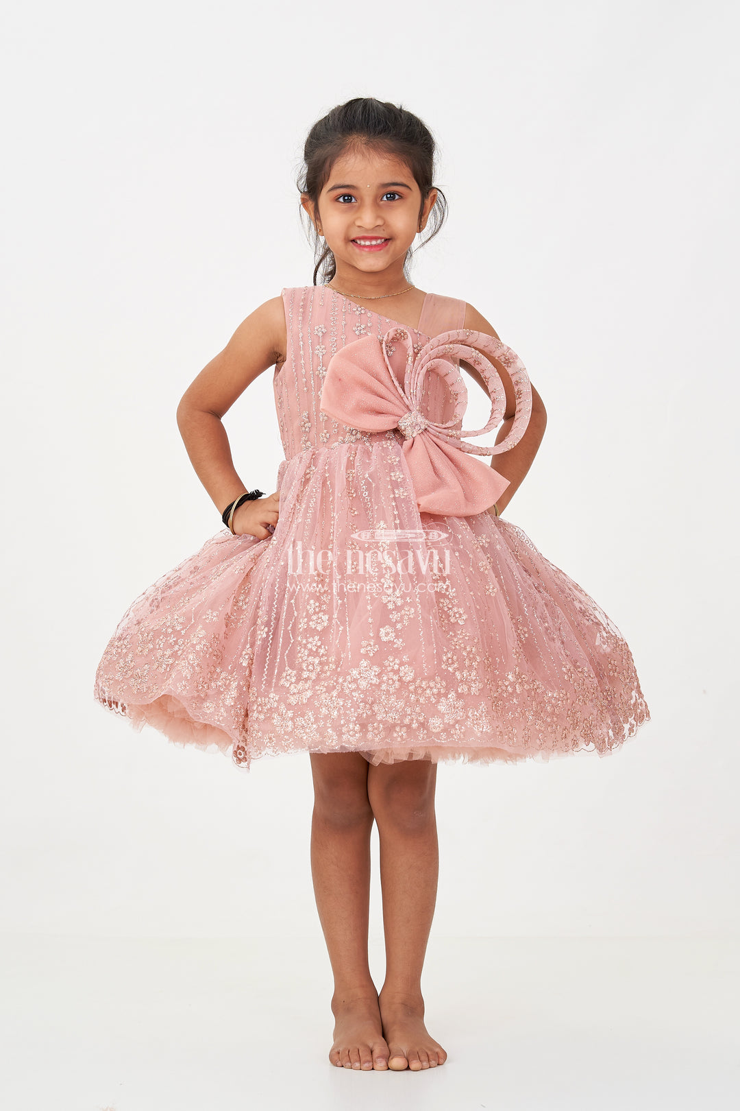 Girls Short Frock Design in Soft Net with Designer Embroidery and Statement Bow Embellishment