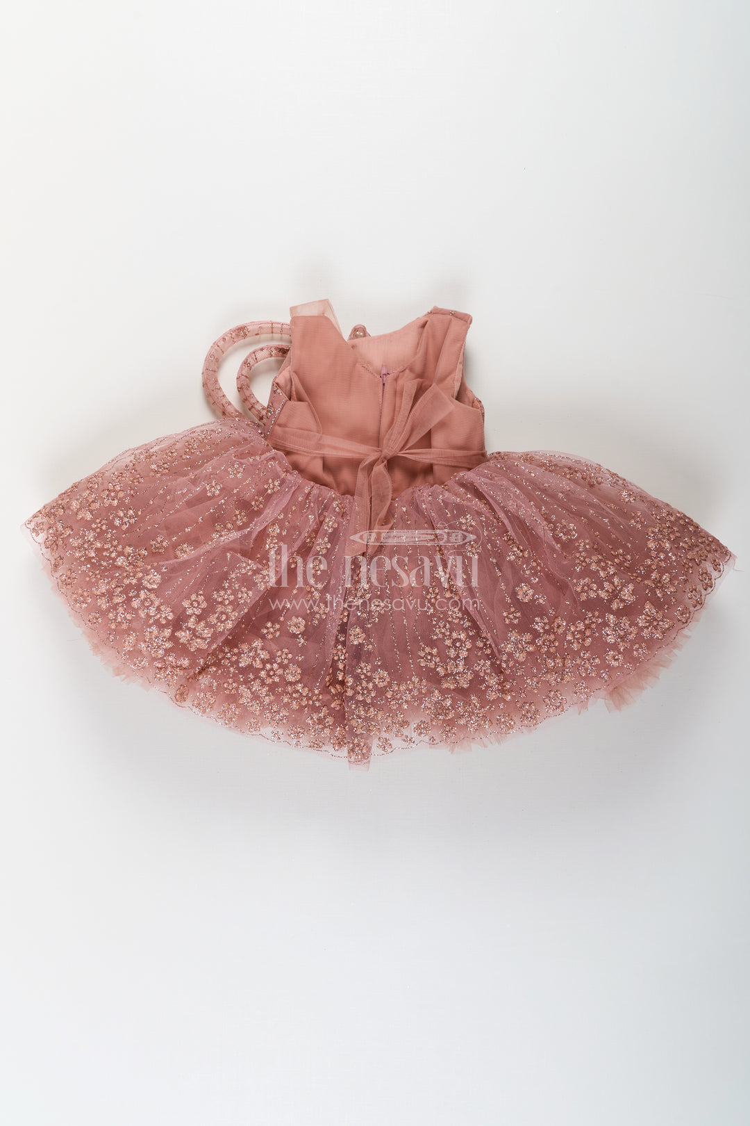 Girls Short Frock Design in Soft Net with Designer Embroidery and Statement Bow Embellishment