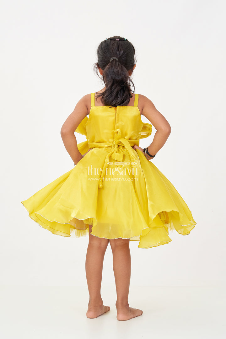 Girls Trendy Frock in Glossy Satin with Floral Waist Embellishment and Flowy Asymmetrical Hem