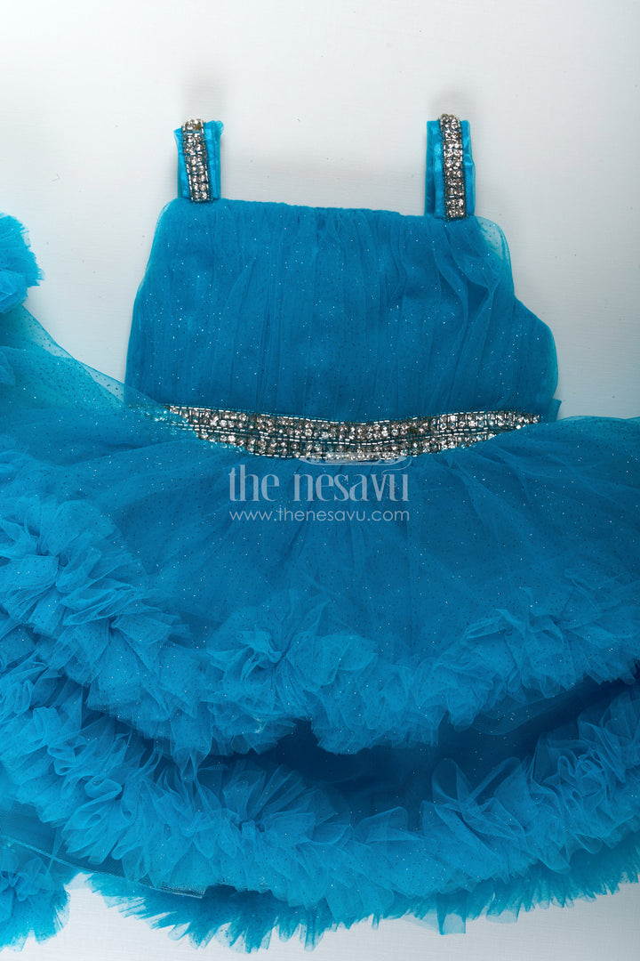 Girls Latest Frock Design in Blue Soft Net with Stone Embellished Belt and Ruffled Skirt