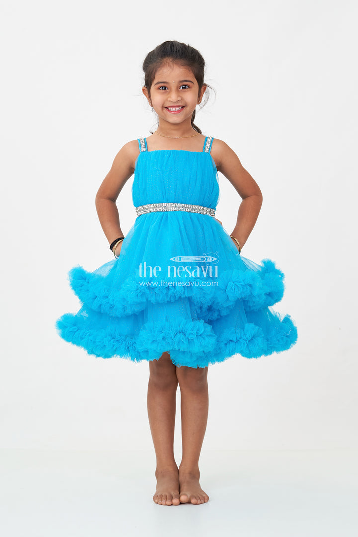 Girls Latest Frock Design in Blue Soft Net with Stone Embellished Belt and Ruffled Skirt
